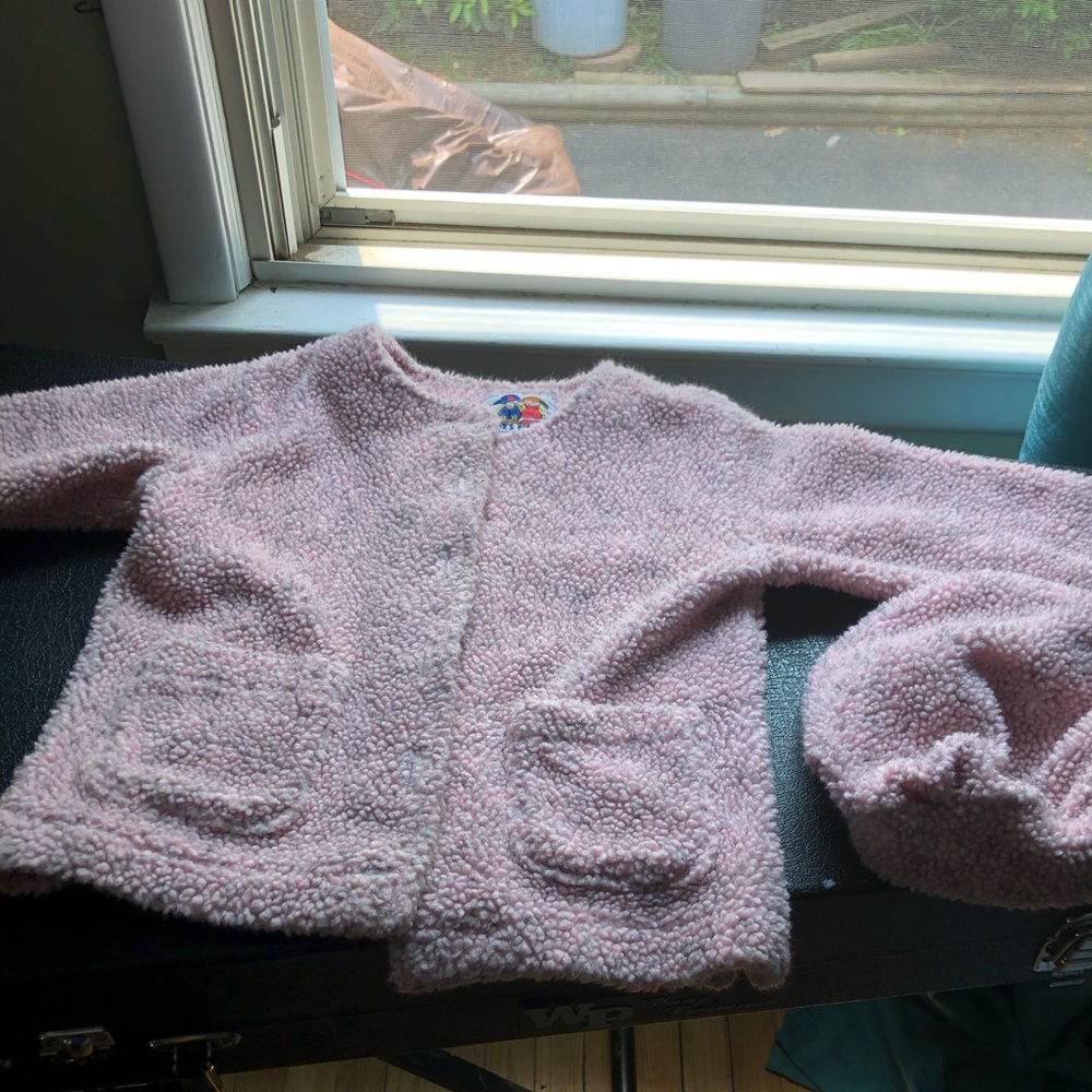 Pete’s Partner pink wooly toddler cost with hat.